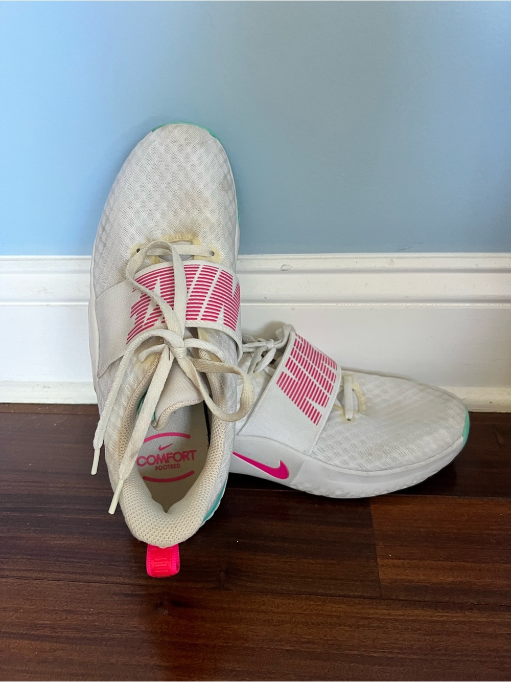 Nike Women's White Athletic Sneakers with Pink Accents